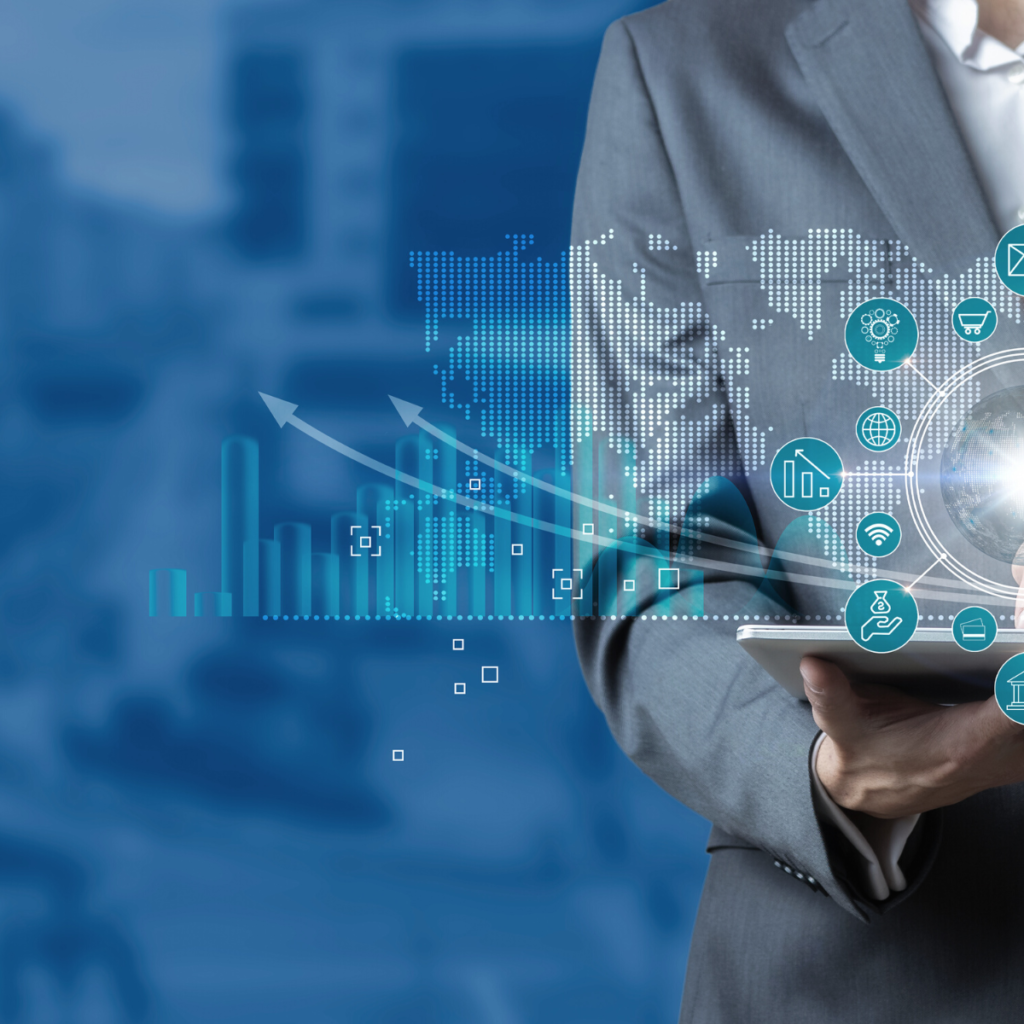 technologie cyfrowe mężczyzna w garniturze trzyma tabler, z którego wychodzą graficzne znaki technologii